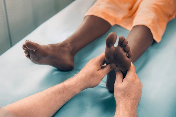 young-afro-woman-podiatrist-2025076721 Podiatrist in Barbados